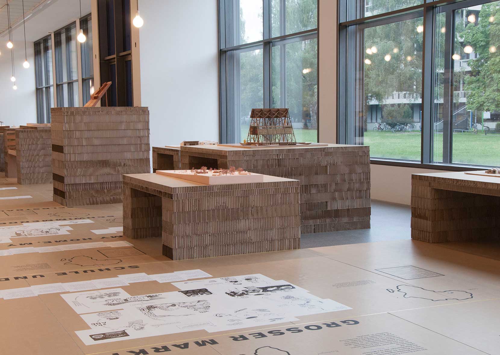 Exhibition with two architectural models