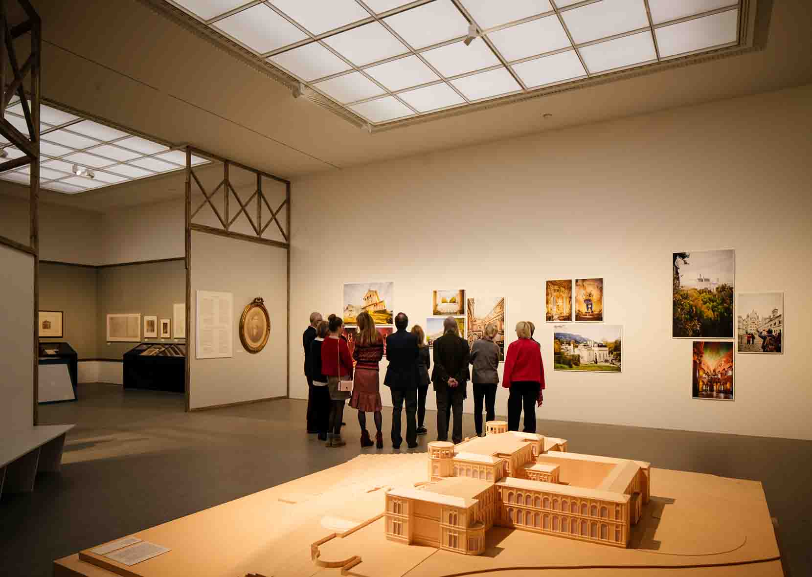 group looking at pictures in exhibition