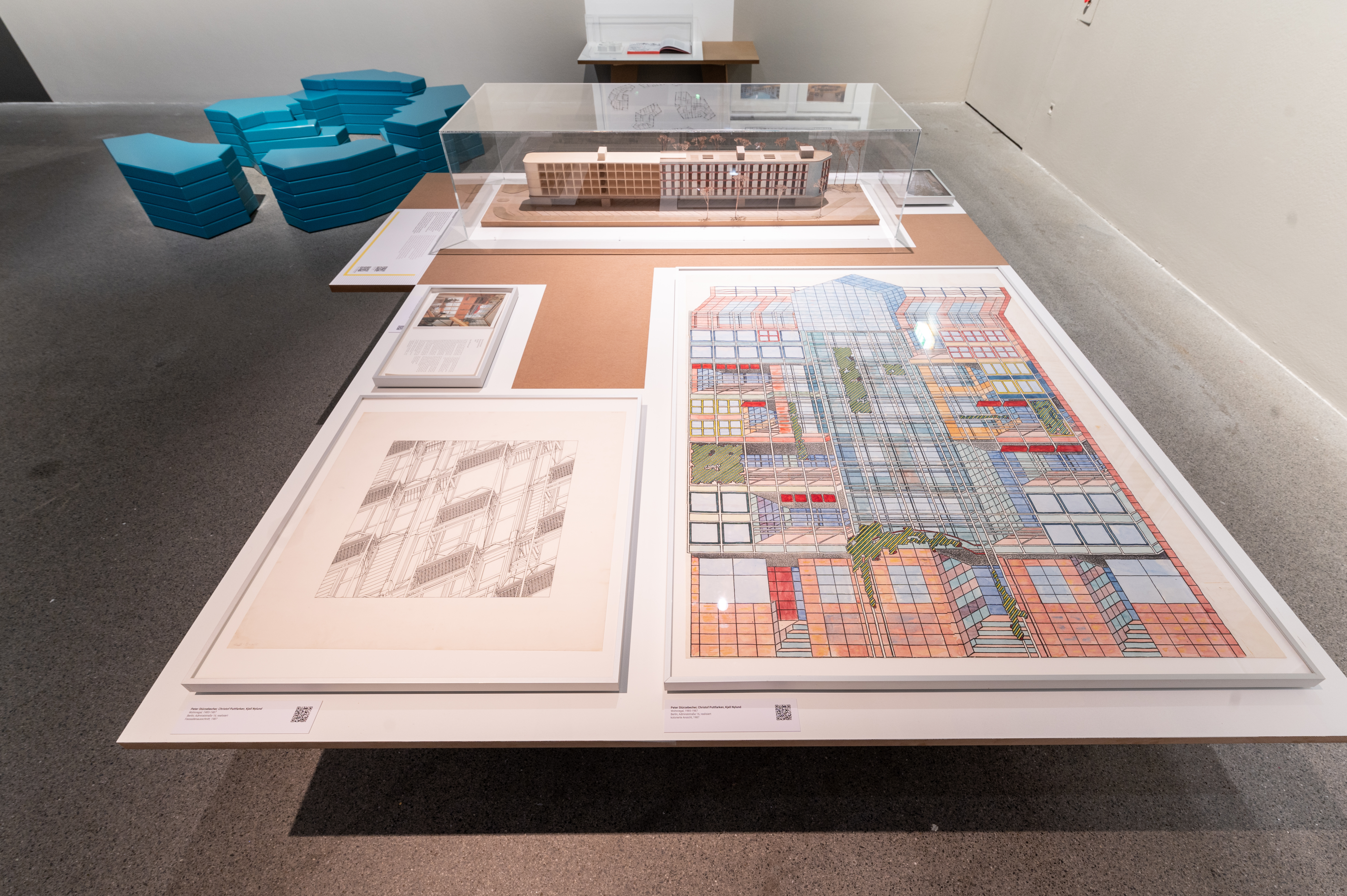 Table in exhibition with "Wohnregal Lichtpause" by Peter Stürzebecher