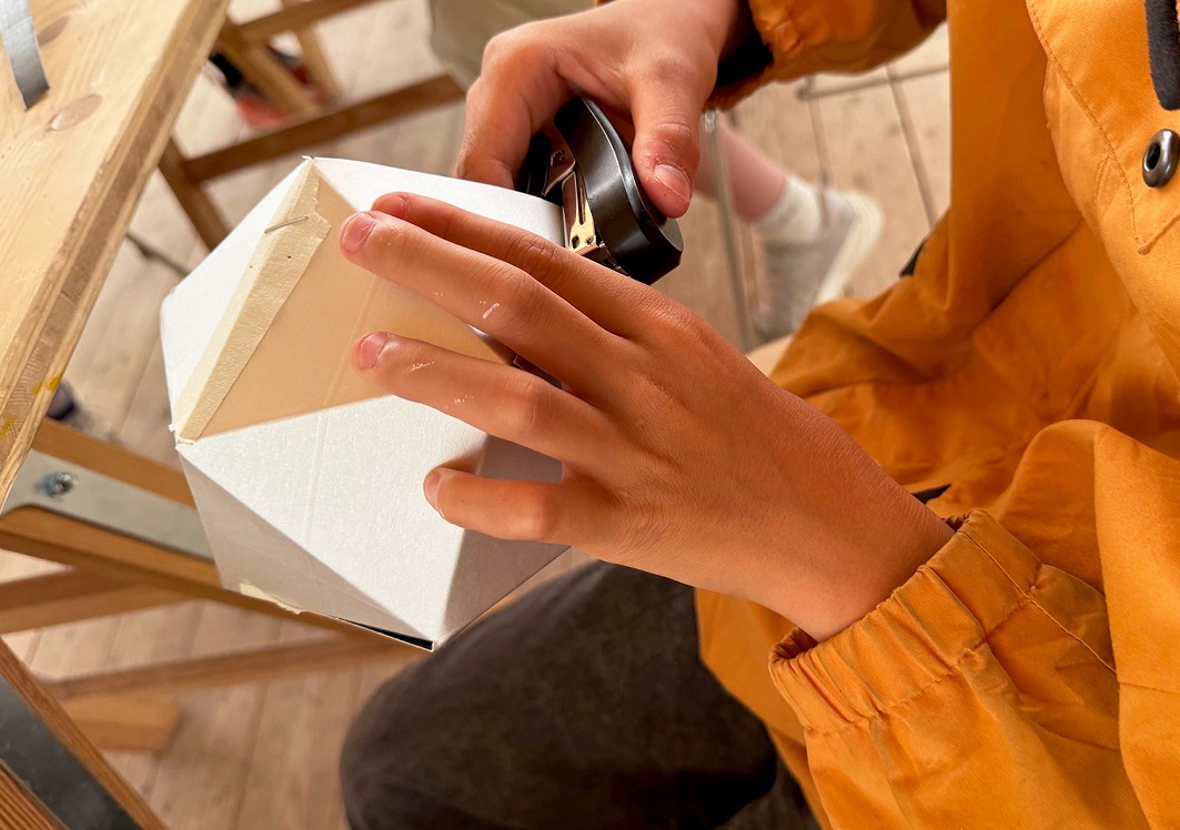 Child's hand while crafting